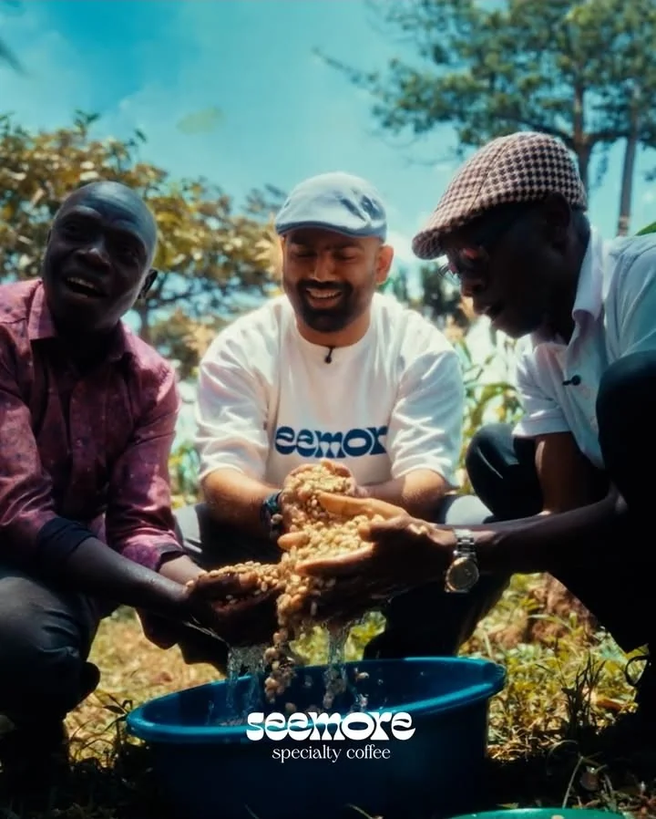 The seemore team washing coffee with farmers at origin